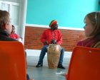 Henri sitting with drum